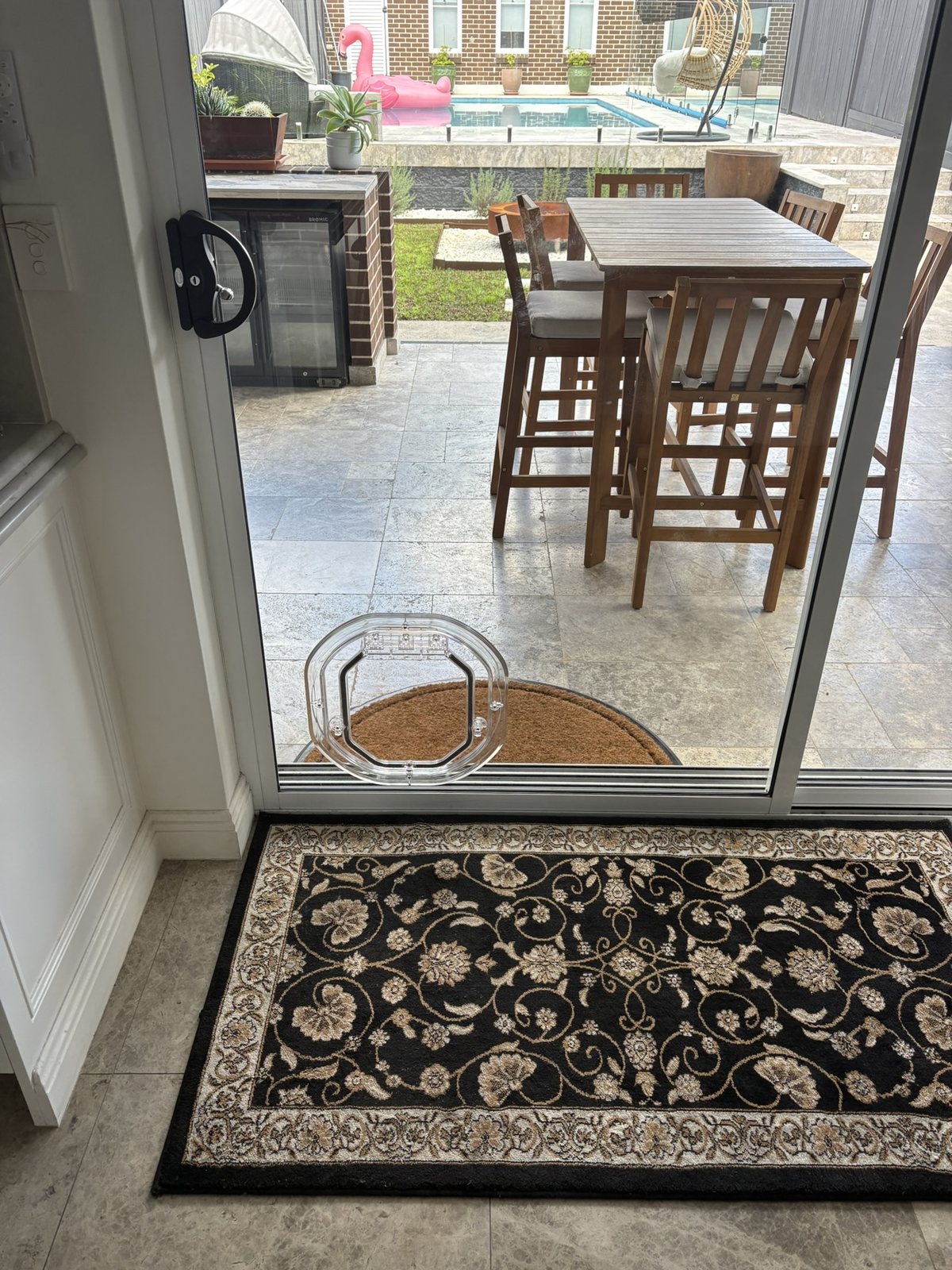 Dogwalk dog door in a sliding glass door