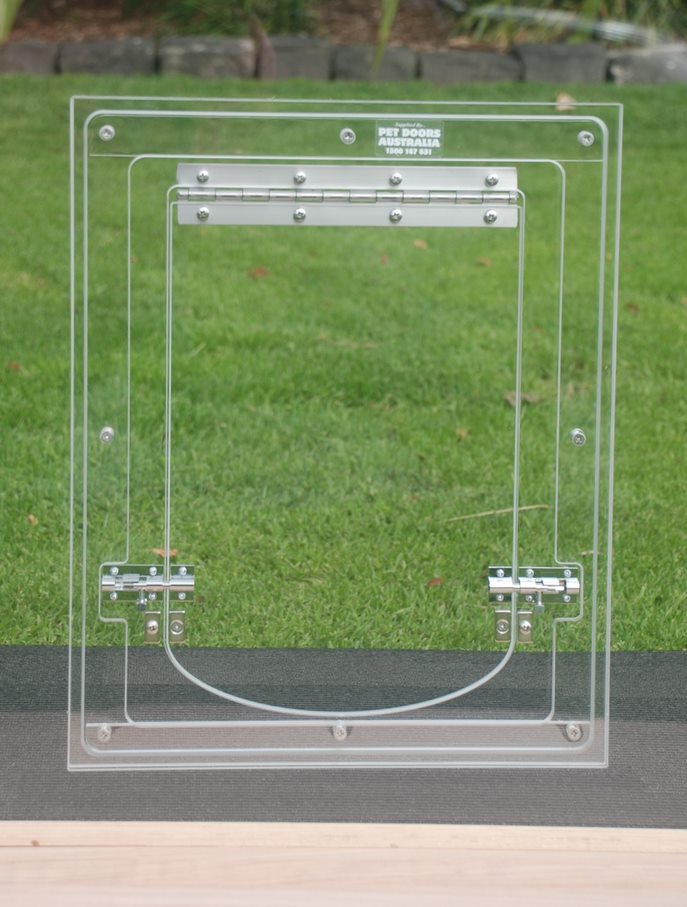 Underbelly clear Perspex glass-fitting pet door with metal hinge and latches